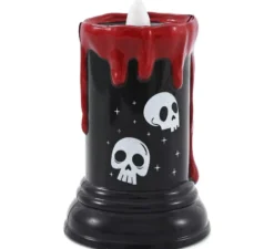 Candela a forma di teschio con luce e musica